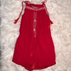 Francesca’s romper with embroidery and tassels